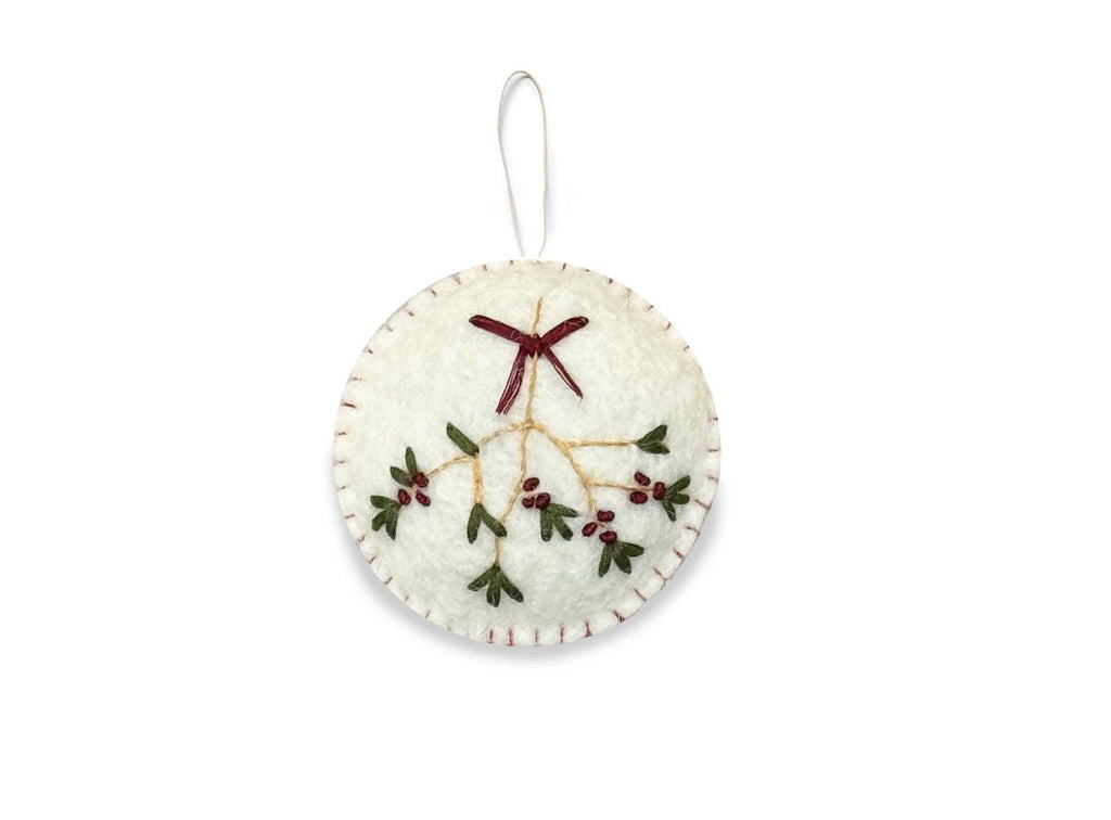 Round pale felt ornament with an embroidered mistletoe sprig and dark red bow
