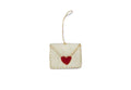 Pale felt envelope-shaped ornament with a red heart