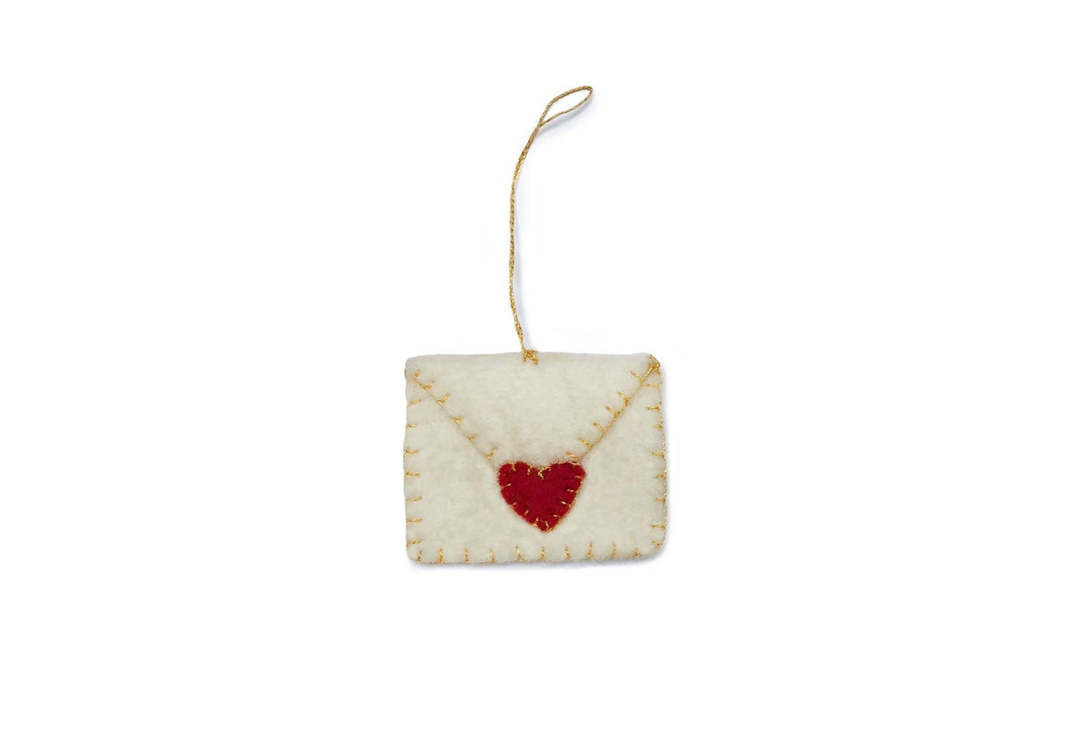 Pale felt envelope-shaped ornament with a red heart